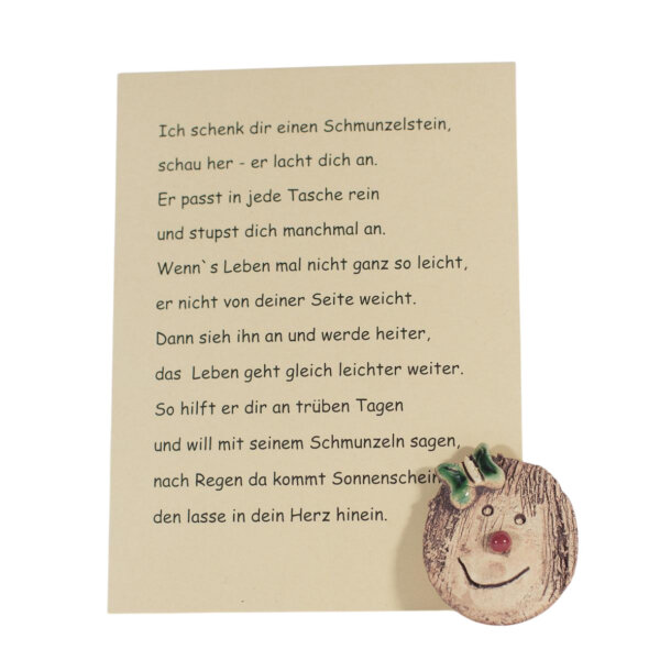 Schmunzelstein mit Schmuck